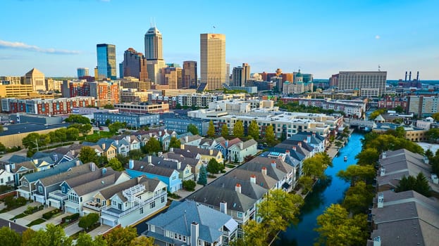 Aerial View of Tranquil Residential Area and Bustling Downtown Indianapolis at Golden Hour