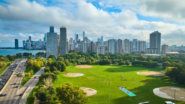 Image of Lincoln Park aerial with Chicago downtown skyscrapers on sunny summer day, tourism