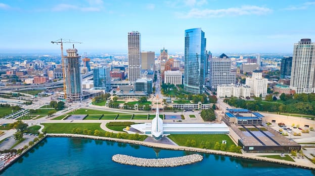 Aerial View of Vibrant Milwaukee Skyline with Modern Skyscrapers, Historical Buildings, and Waterfront Park, Wisconsin, 2023
