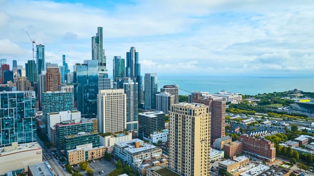Image of Chicago downtown big city buildings and skyscrapers aerial, travel tourism with Lake Michigan