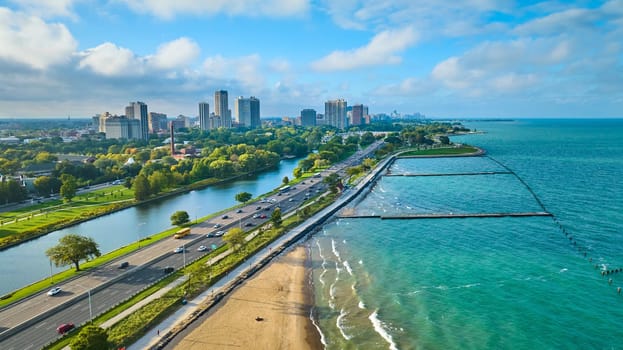 Image of Tourism beach, sandy coast for Chicago travel aerial beside Lake Michigan on summer day