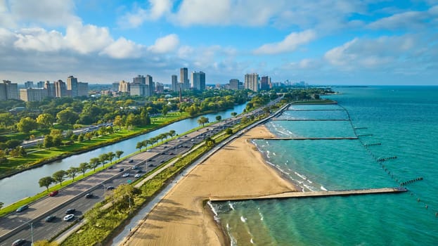 Image of Gorgeous tourism beach, sandy coast for Chicago travel aerial beside Lake Michigan on summer day