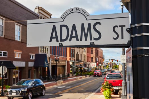 Sunny Day on Adams Street in Downtown Muncie, Indiana Highlighting City Life and Urban Navigation