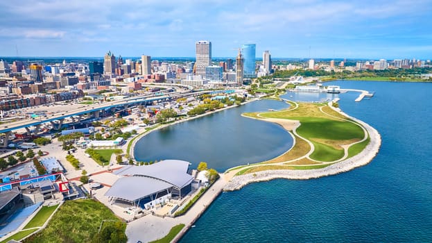 Aerial View of Vibrant Milwaukee Cityscape, Lake Michigan Waterfront, and Infrastructure, Showcasing Urban Development and Recreation
