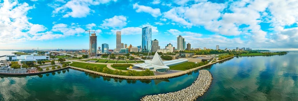 Aerial Panorama of Milwaukee featuring the iconic Quadracci Pavilion, the bustling Lake Michigan coastline, and vibrant cityscape development in 2023