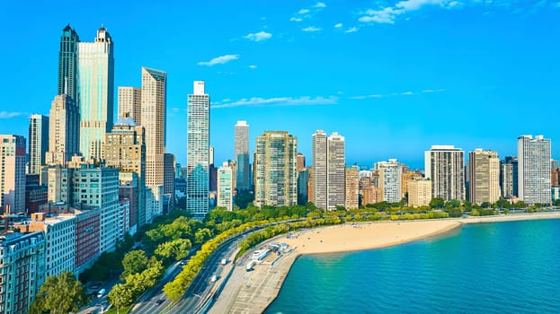 Image of Chicago aerial tourism beach coastline with Lake Michigan water on bright summer day