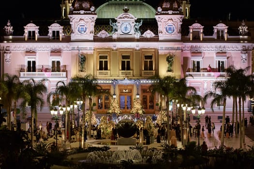 Monaco, Monte-Carlo, 12 November 2022: The Indian wedding celebration in the square of the famous Casino Monte-Carlo is at night, attraction night illumination. High quality photo