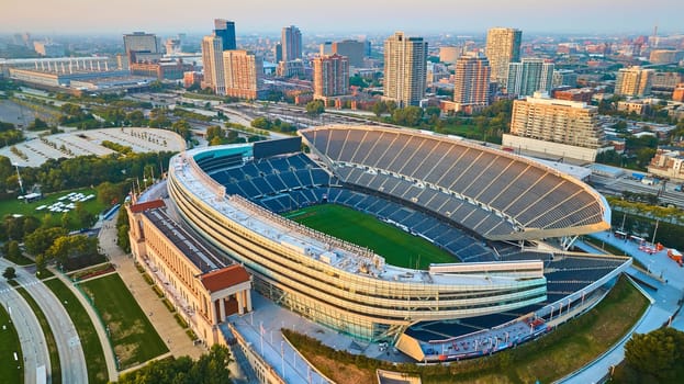 Image of Aerial sports Soldier Field Chicago football stadium at sunrise, Illinois in summer
