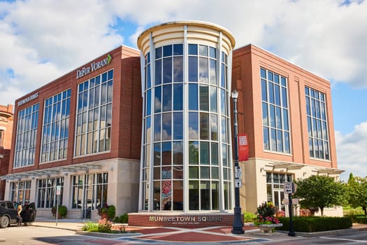 Modern multi-story office building with glass feature in Muncie, Indiana, depicting urban growth and professionalism