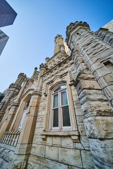 Image of Chicago water tower, historic castle building with original architecture, upward view, tourism
