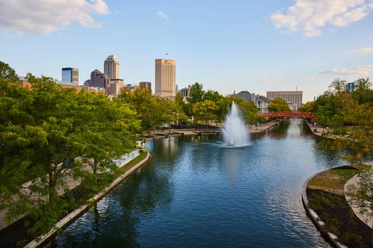 Summer View of Serene Urban Park with Fountain in Indianapolis, Indiana, 2023 - Blend of Nature and Modern Cityscape