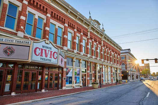 Sunrise illuminates the historic Muncie Civic Theatre in downtown Indiana, highlighting the charm of small-town America in 2023.