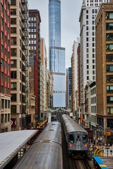 2023 Urban Energy in Chicago, Illinois with Sleek Trains on Elevated Tracks Leading to Trump Tower