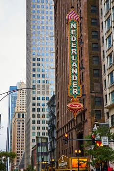 Image of Nederlander sign, Chicago on side of skyscraper building on gloomy day
