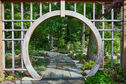 Serene Garden Pathway under Wooden Archway in Elkhart Botanic Gardens, Indiana, 2023 - A Tranquil Journey through Nature's Beauty