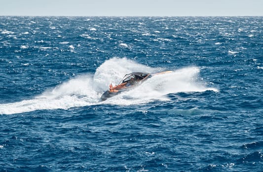 A motorboat is sailing at high speed in the sea near Monaco. High quality 4k footage