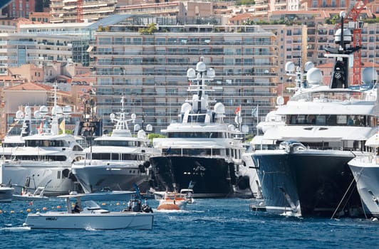 Monaco, Monte Carlo, 28 September 2022 - Top view of the famous yacht show, exhibition of luxury mega yachts, the most expensive boats for the richest people around the world, yacht brokers. High quality photo