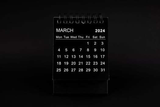 Black Calendar for March 2024. Desktop calendar on a black color background.