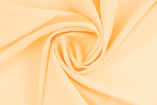 Abstract yellow or beige cloth pattern.