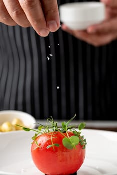 Tomato Caprese salad with mozzarella and micro sprouts