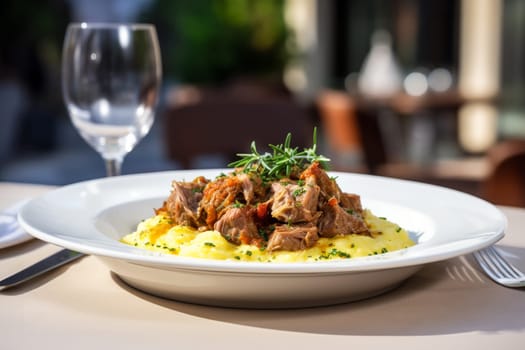 Cassoeula, traditional Lombardy dish with a stew made with pork meat and cabbage, often served with polenta. Italian seasonal comfort dish.