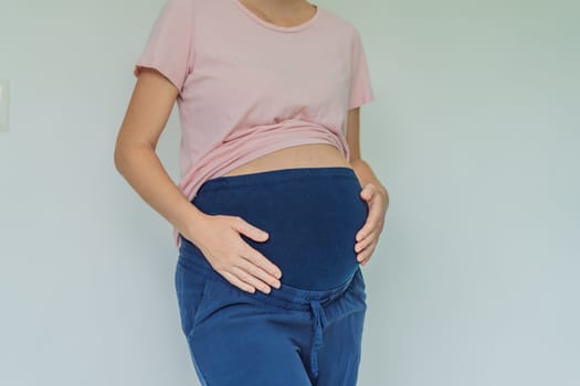 Chic maternity pants, comfy belly insert for expecting moms - stylish, practical, and perfect for the journey into motherhood.