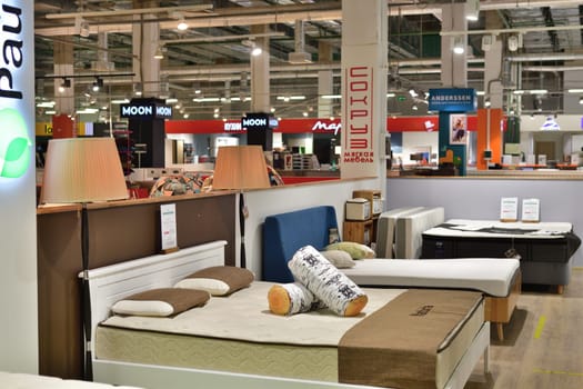 Moscow, Russia - June 09. 2021. Sale of beds with mattresses in Furnituregood store