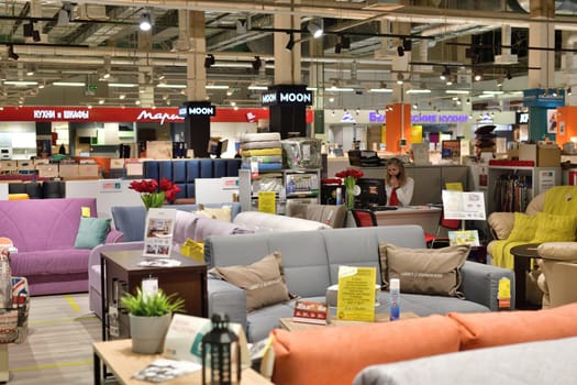 Moscow, Russia - June 09. 2021. Sale of sofa in Furnituregood store