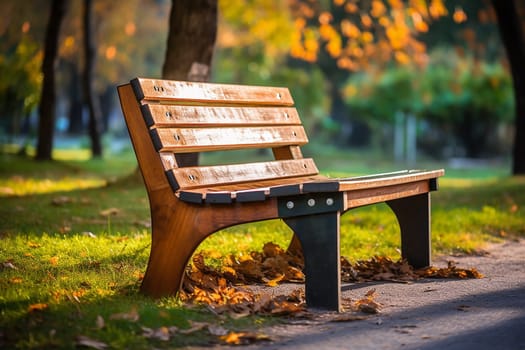 A photo of a bench in a park with tree and grass, bench in a garden on a sunny day outside