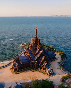 The Sanctuary of Truth wooden temple in Pattaya Thailand in the warm evening light at sunset