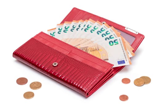 Opened Red Women Purse with 50 Euro Banknotes Inside and Scattered Euro Cent Coins - Isolated on White Background. A Wallet Full of Money Symbolizing Wealth, Success, Shopping and Social Status - Isolation