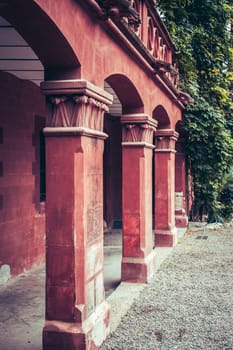 Columns of ancient fortified defense tower photo. Historical center of old medieval town Viladecans, Catalonia, Spain. Street scene. High quality picture for wallpaper, article