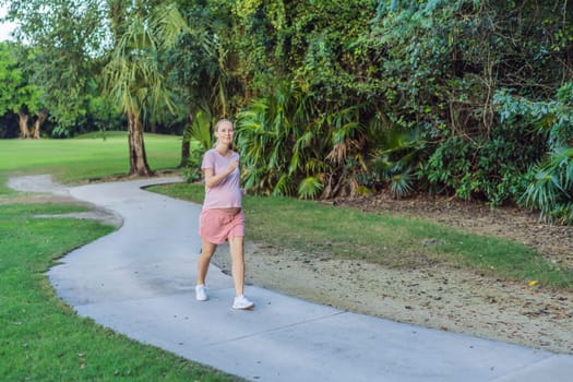 Active and determined, a pregnant woman maintains a healthy lifestyle, jogging with a focus on well-being and fitness during pregnancy.