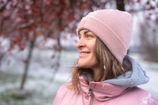 Winter Elegance: Portrait of a Beautiful Girl in a Snowy European Village