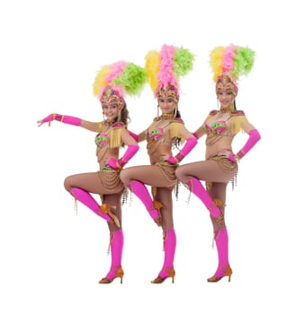Alluring female dancers dressed in carnival costumes