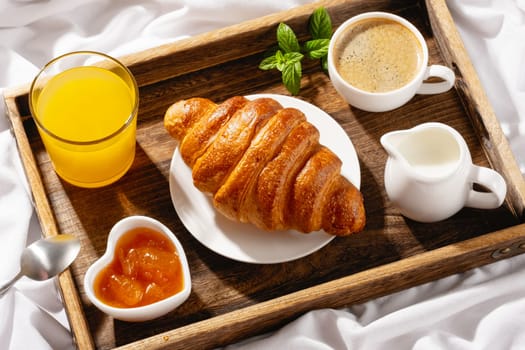 Breakfast in bed on a sunny morning.