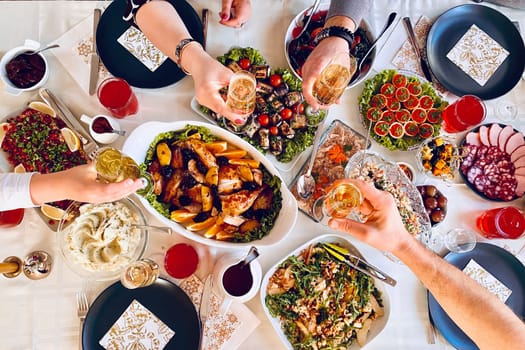 wonderful set table with a variety of festive dishes from home cooking, a festive family dinner, friendly company. Overhead view