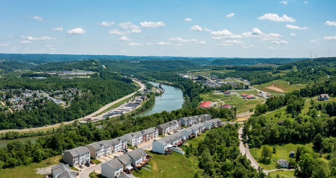 Aerial drone view of the industrial business park of Morgantown and the Monongahela river looking south