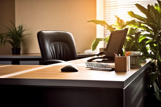 Modern office desk with a computer, keyboard, and plant in the background. Sunlight is streaming in through the window