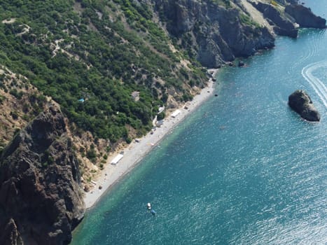 Aerial panoramic view of beautiful sunset above sea. Beautiful seascape. Sun glare, small waves on the water surface. Evening. Horizon. Nobody. No people. Copy space. Never-ending beauty of nature