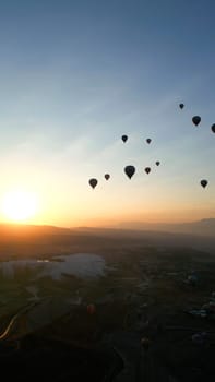 Amazing Aerial Footage of Hot Air Balloons in Pamukkale during the sunrise. High quality photo