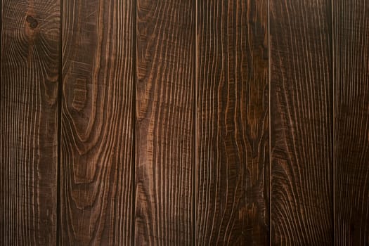 Texture of dark brown wooden vertical boards. High quality photo