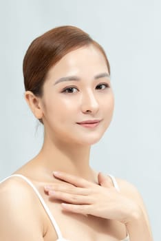 Beautiful young asian woman with clean fresh skin