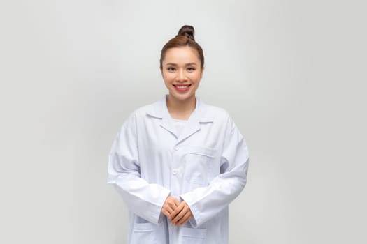  happy smiling female doctor or scientist in white coat