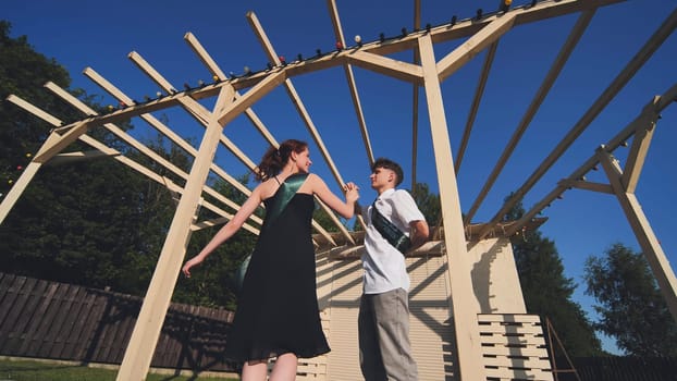 High school graduates dancing the school waltz outside