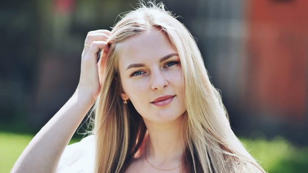 Portrait of a blonde girl of Slavic appearance. Close-up face