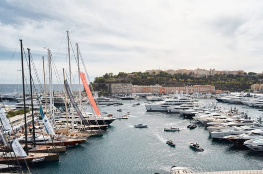 Monaco, Monte Carlo, 29 September 2022 - a lot of luxury yachts at the famous motorboat exhibition, the most expensive boats for the richest people, yacht brokers, boat traffic. High quality photo