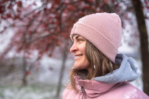 Winter Elegance: Portrait of a Beautiful Girl in a Snowy European Village