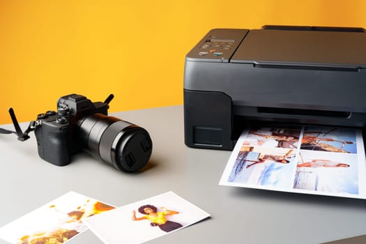 Printer printing colorful photos of people close up, yellow background, studio shot