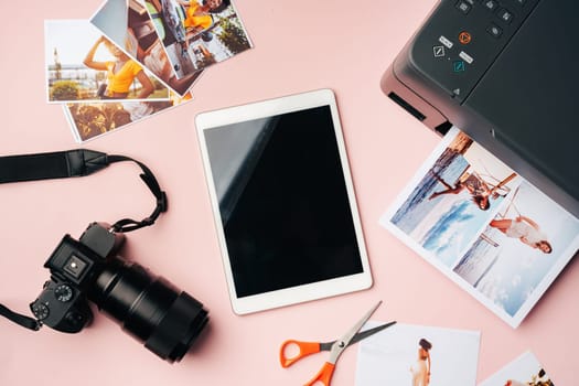 Printer, photo camera and digital tablet on the table. Printing photos concept